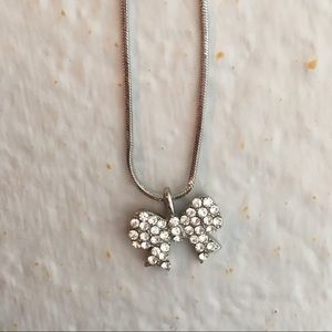 Simple silver diamond bow necklace